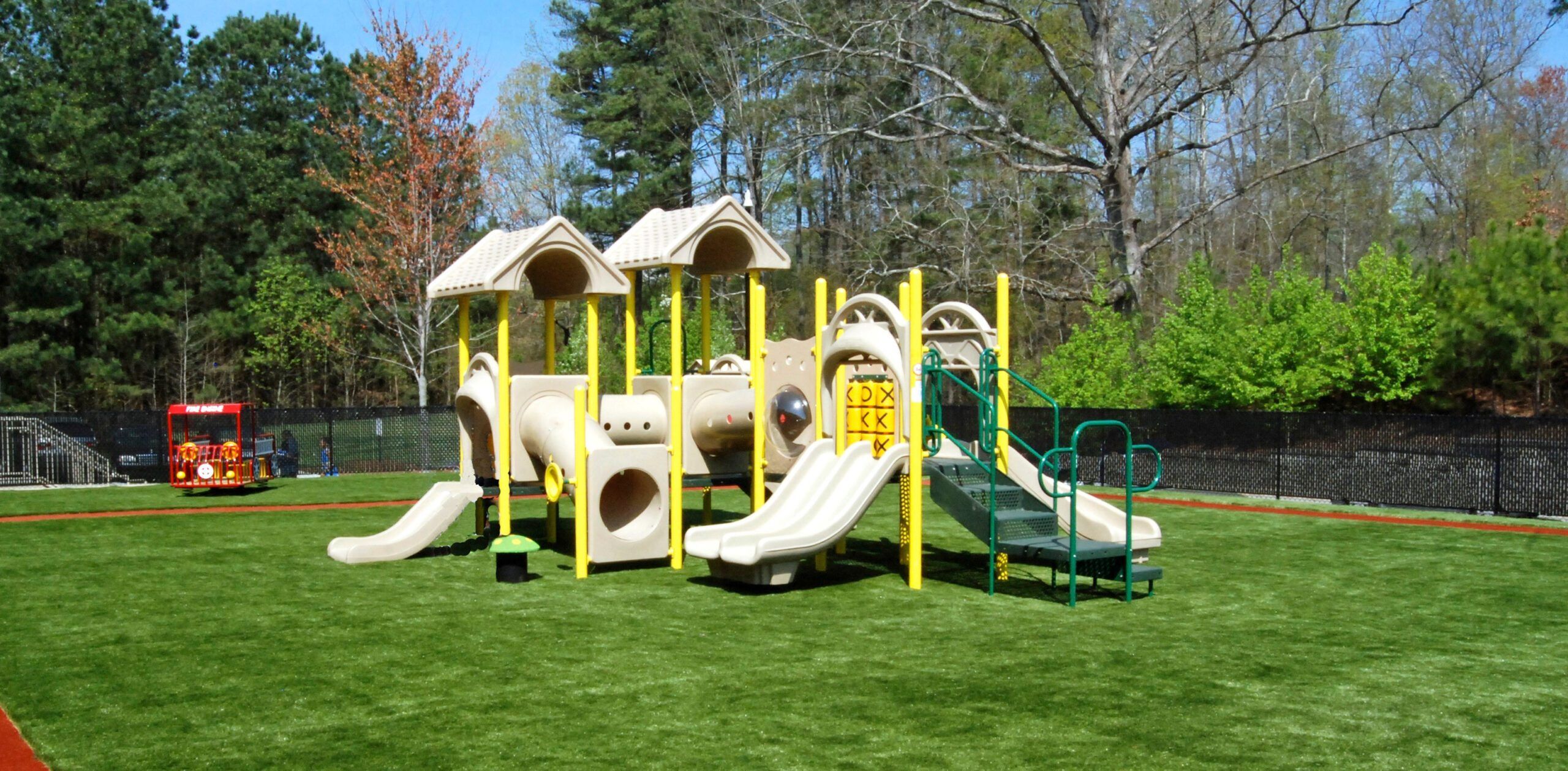 Grass365 offers synthetic grass for playgrounds.