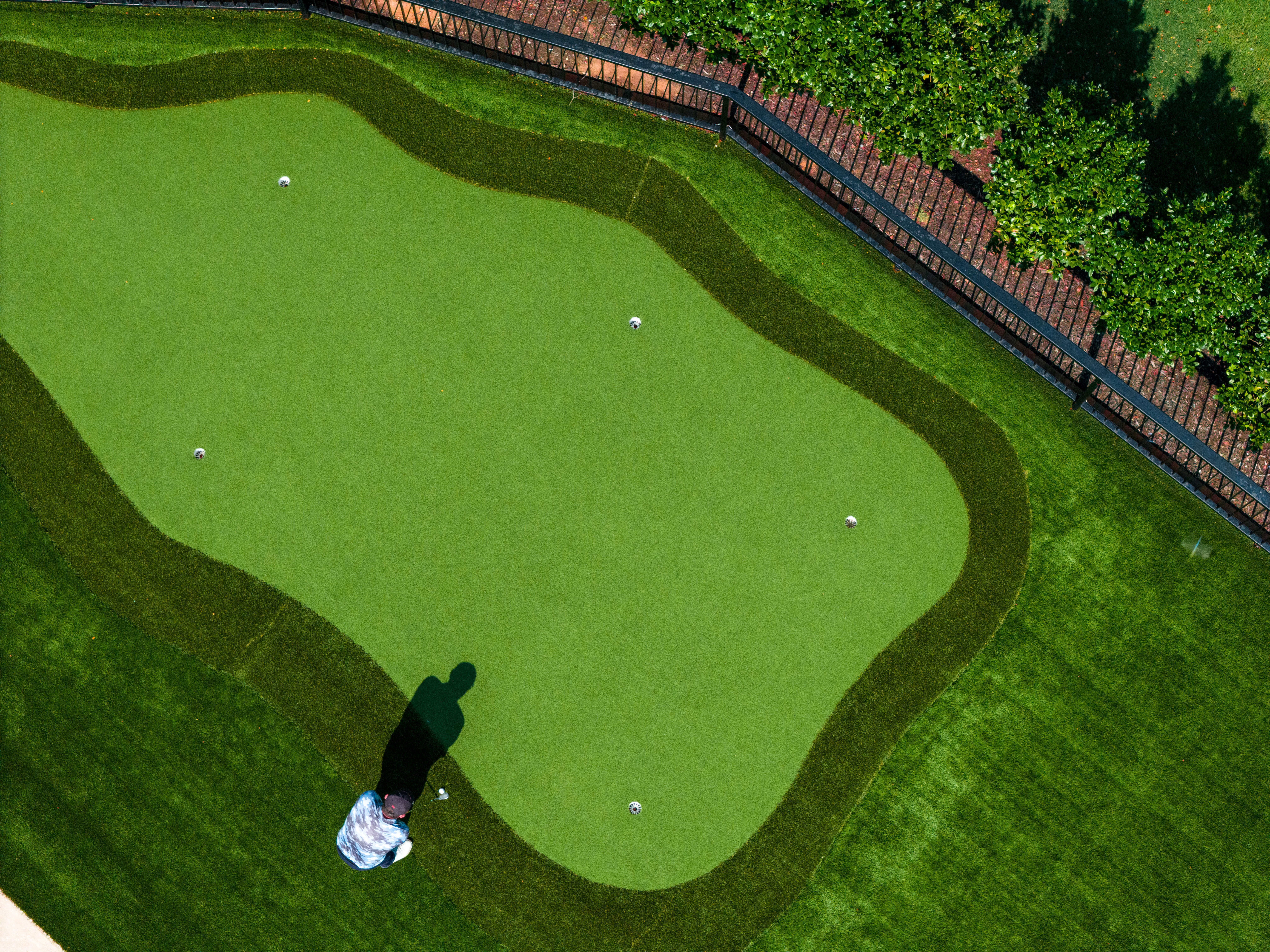 putting green next to pool gleneagles cc dallas