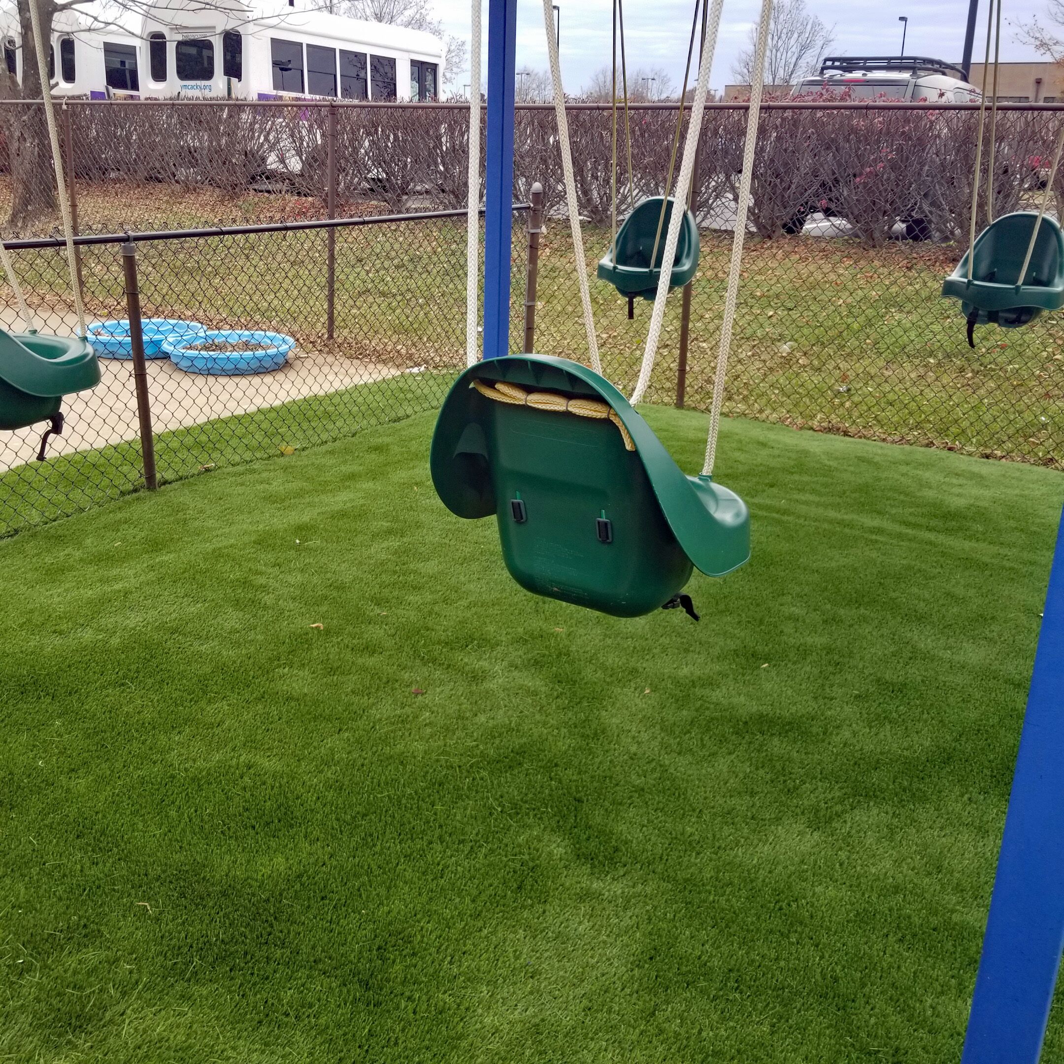 synthetic turf under swings at lexington day care